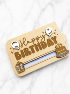 Wooden birthday gift card holder showing gift card inserted into sliding slot