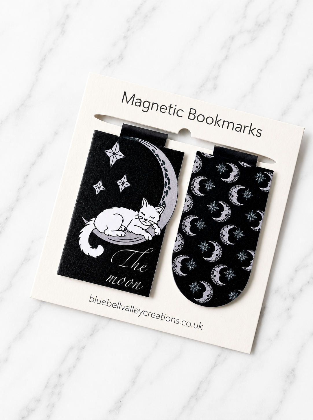 Moon cat magnetic bookmark set displayed on Bluebell Valley Creations branded packaging