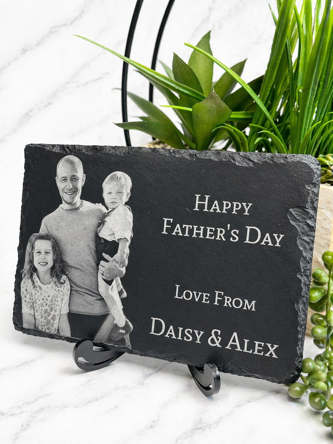 Custom engraved family photo slate with dad and children, personalised Father’s Day gift with green plant background