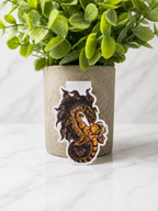 Magnetic bookmark featuring a detailed gold and bronze dragon with an orb and smoke 
