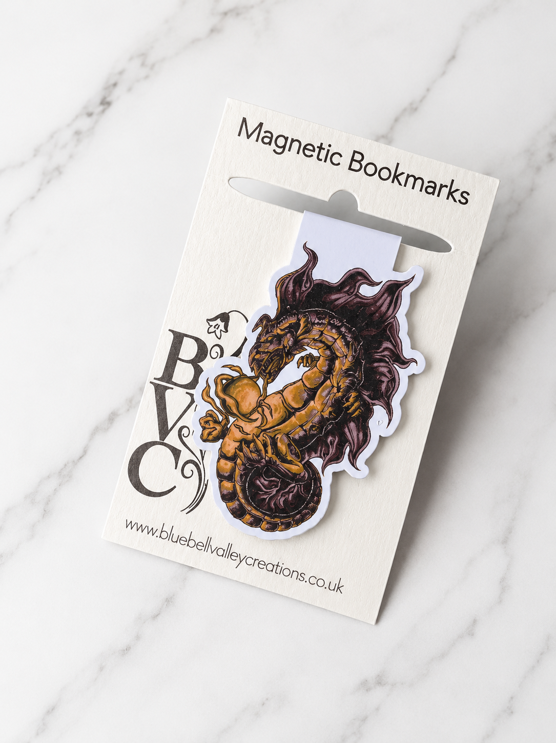 Dragon magnetic bookmark displayed on Bluebell Valley Creations branded backing card