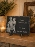 Personalised family photo slate for Father’s Day displayed on wooden shelf with candle and home decor