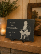 Personalised Father’s Day photo slate with engraved dad and baby image, displayed on wooden shelf with candle