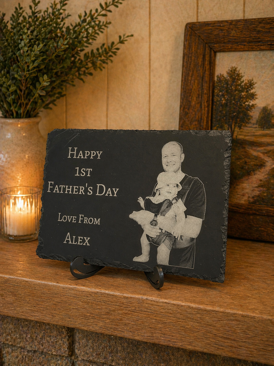 Personalised Father’s Day photo slate with engraved dad and baby image, displayed on wooden shelf with candle