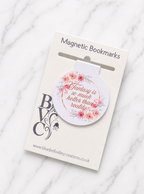 Floral quote magnetic bookmark displayed on branded backing card packaging, showing gift-ready presentation for readers who enjoy romance and fantasy books
