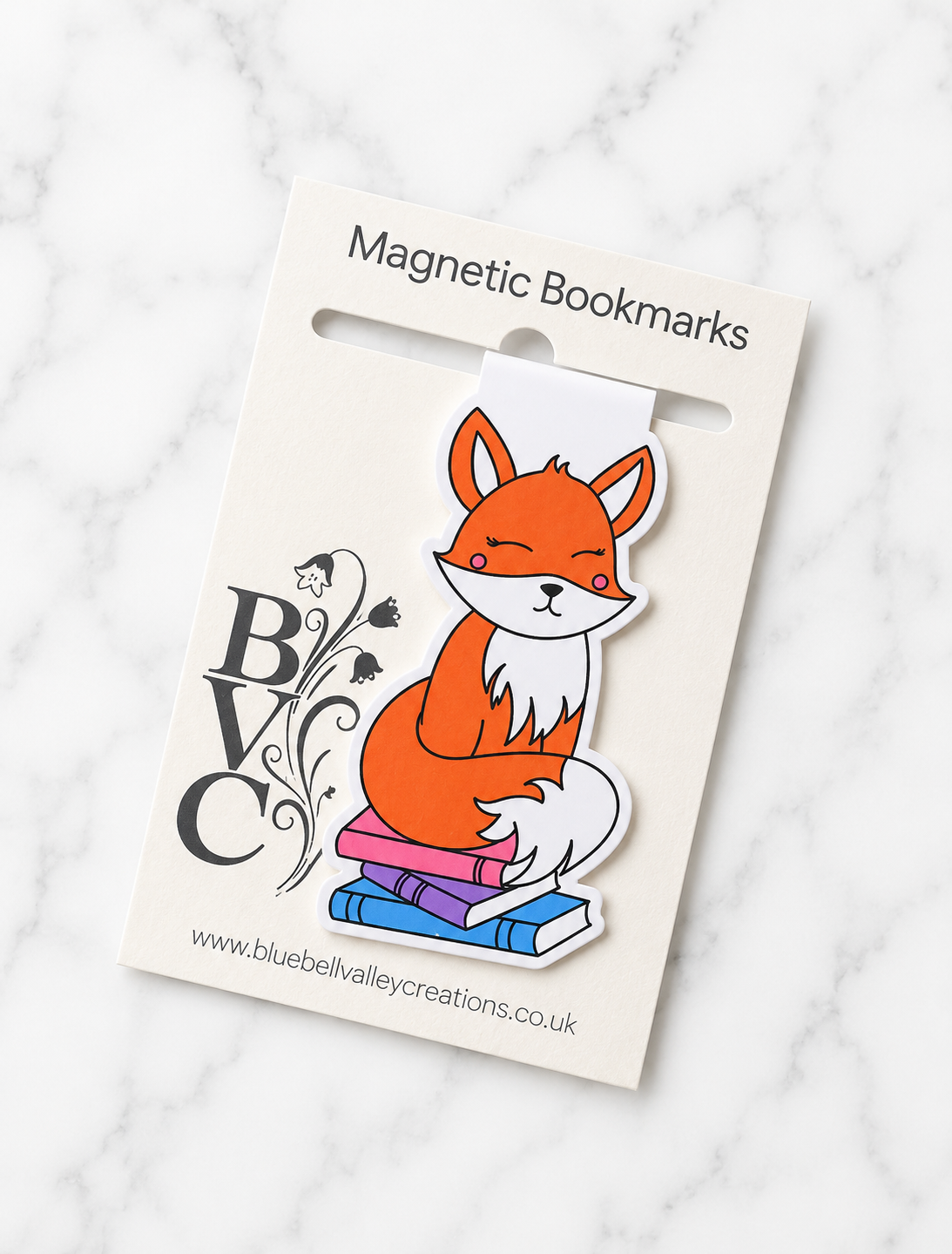 Fox magnetic bookmark displayed on Bluebell Valley Creations branded packaging on a marble background