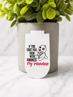 White magnetic bookmark featuring a voodoo doll illustration and humorous quote “If you can’t kill them with kindness try voodoo”, displayed against a marble background