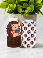 Two magnetic bookmarks featuring a hedgehog reading and a matching hedgehog pattern design displayed together