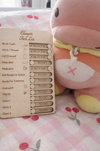 Personalised kids chore chart wooden board with sliders, children’s daily routine organiser gift displayed in bedroom setting