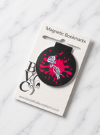Black gothic magnetic bookmark displayed on branded backing card ready for gifting