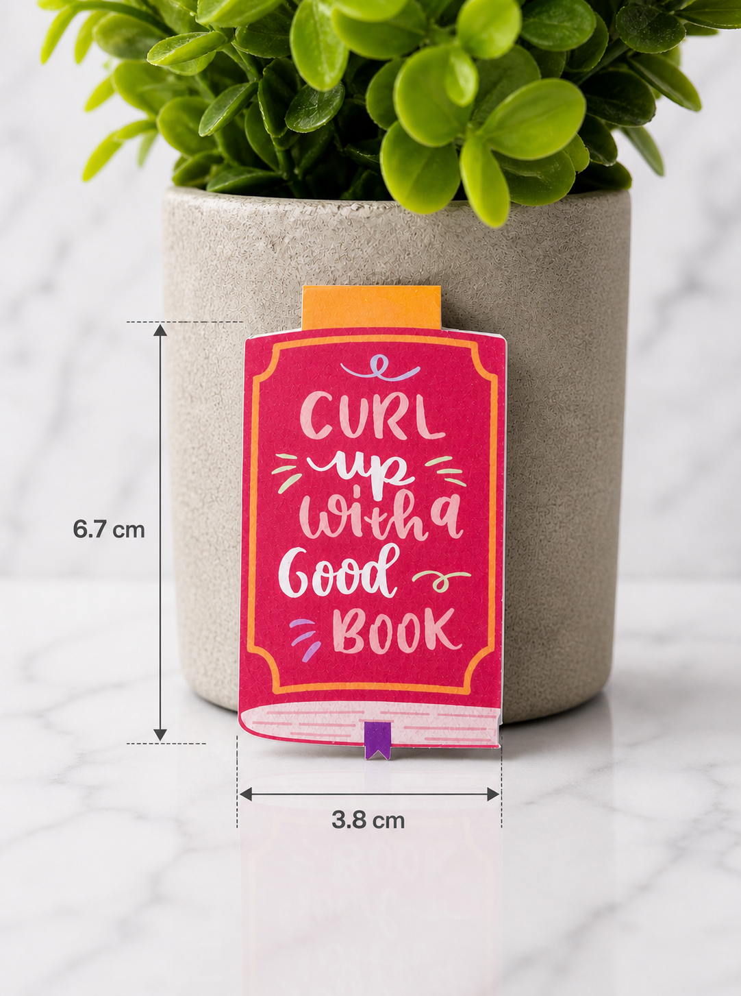 Pink magnetic bookmark with quote showing size 6.7cm by 3.8cm
