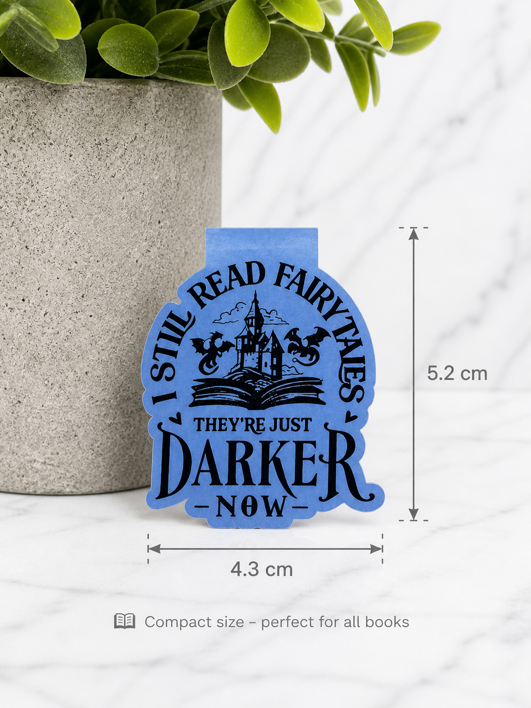 Blue magnetic bookmark with gothic fairytale quote showing size 5.2cm by 4.3cm
