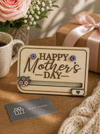 Wooden mothers day gift card holder displayed with flowers and wrapped gift in home setting