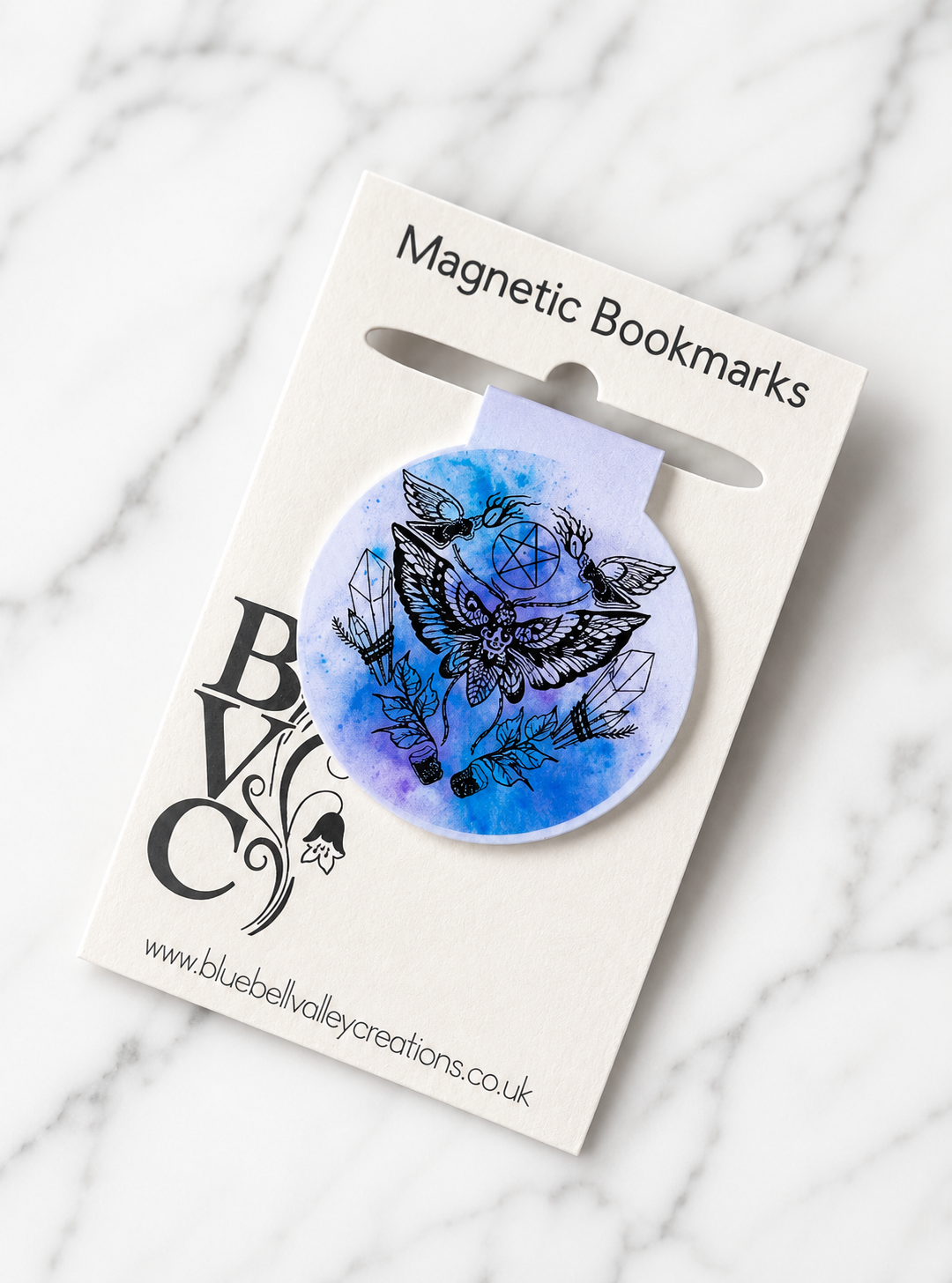 Moth and crystal magnetic bookmark displayed on Bluebell Valley Creations branded packaging