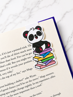panda magnetic bookmark clipped onto a book page showing practical everyday use for readers
