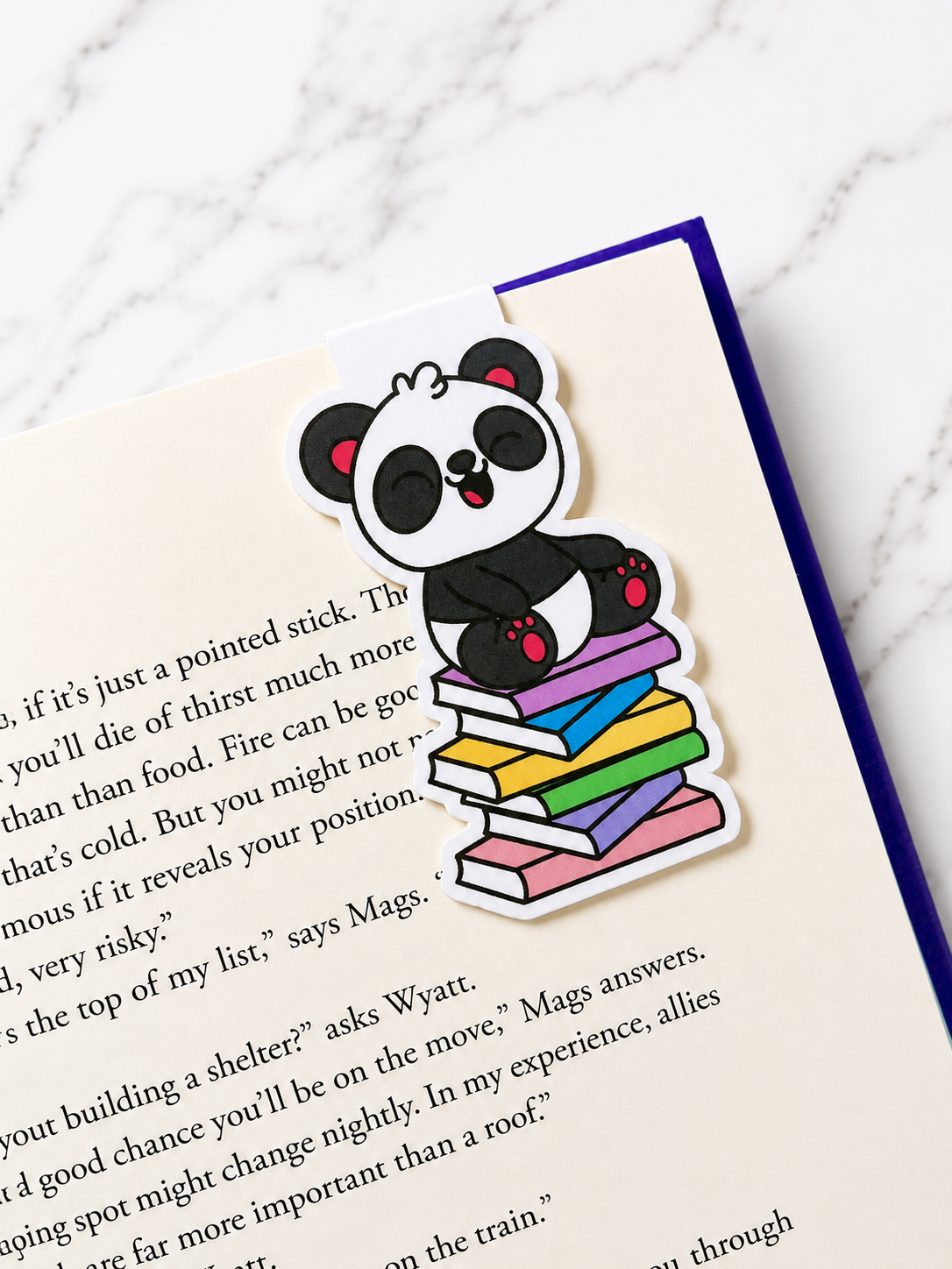 panda magnetic bookmark clipped onto a book page showing practical everyday use for readers