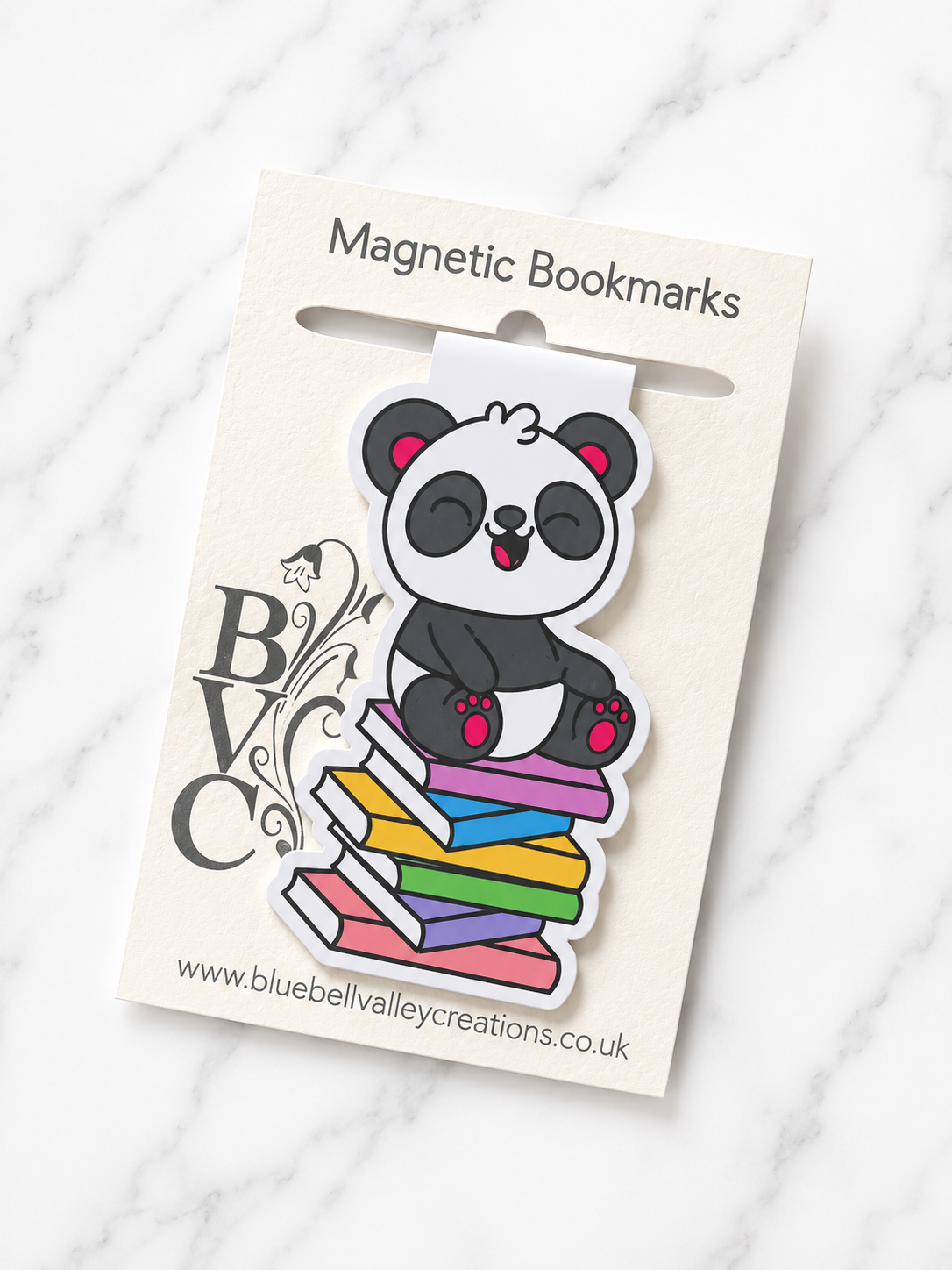 Panda magnetic bookmark displayed on Bluebell Valley Creations branded packaging with clean marble background