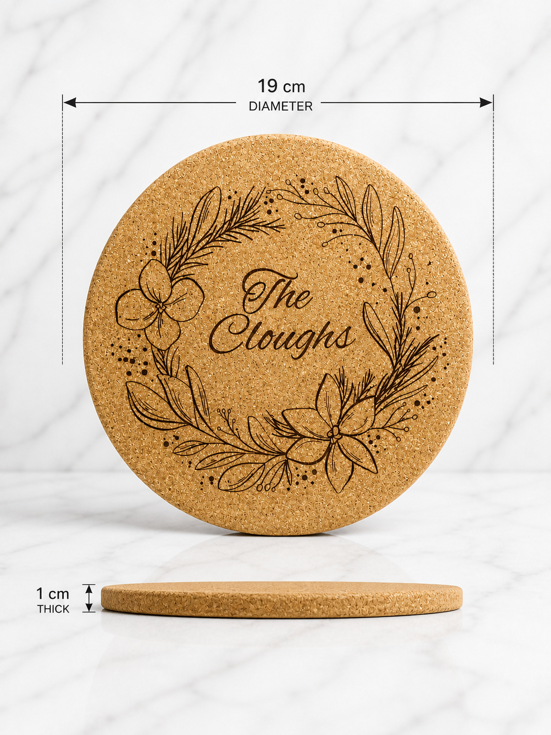 Round personalised cork trivet with engraved floral wreath design showing 19cm diameter and 1cm thickness