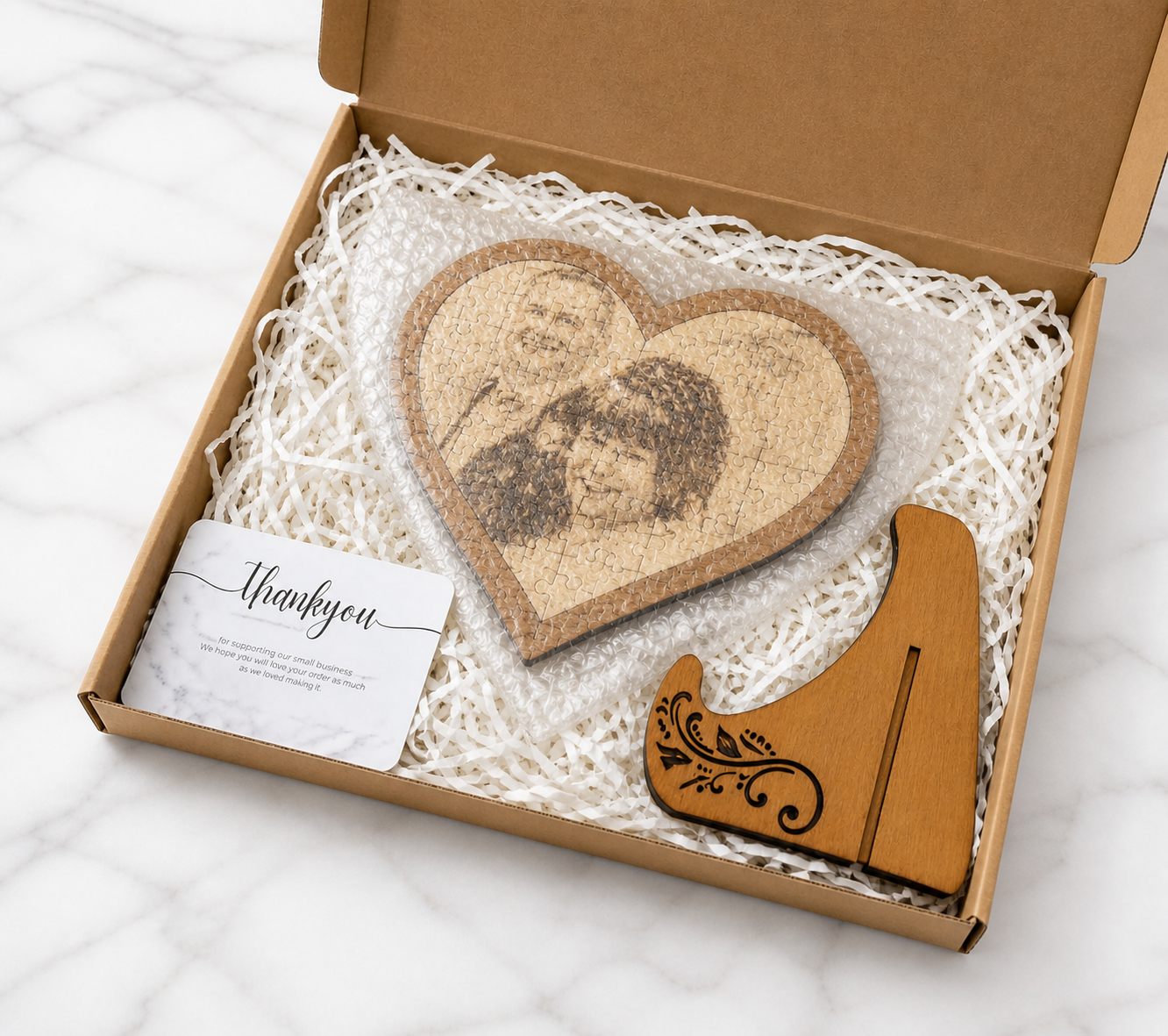 Wooden heart photo puzzle packaged in gift box with protective wrap and display stand included