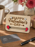 Valentine’s Day wooden gift card holder displayed on desk with gift card flowers and coffee romantic gift idea