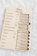 Personalised kids chore chart wooden board with sliders, children’s daily routine organiser gift displayed on white surface