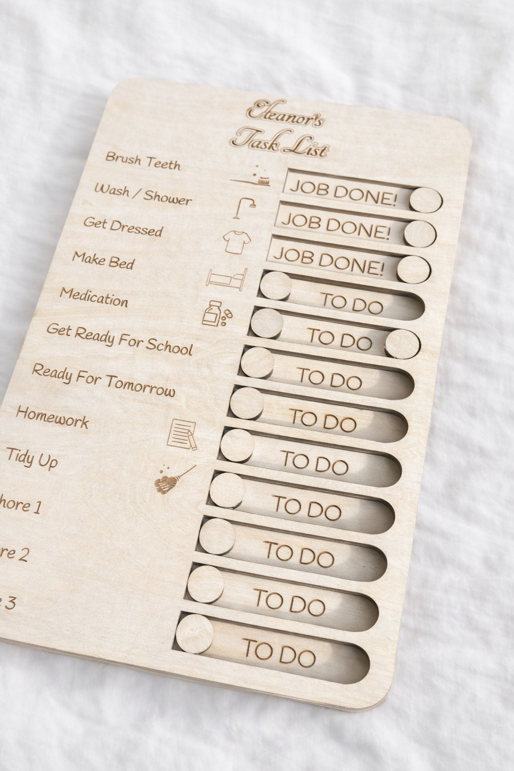 Personalised kids chore chart wooden board with sliders, children’s daily routine organiser gift displayed on white surface- Located at the Ribble Valley