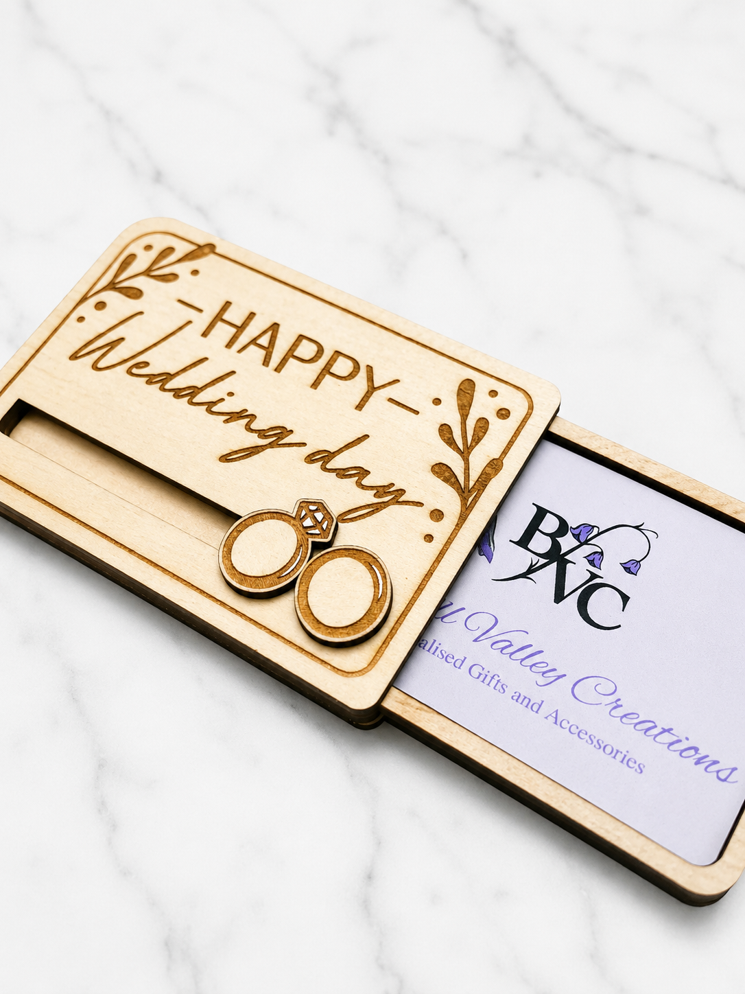 Wooden wedding gift card holder showing gift card partially inserted into sliding compartment