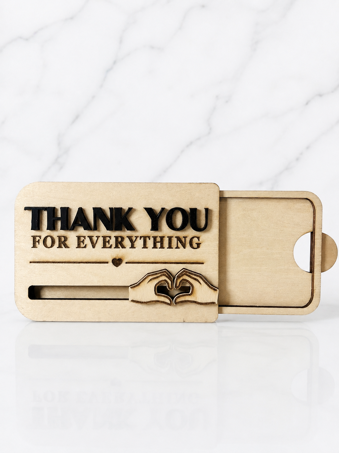 Wooden gift card holder with sliding insert mechanism showing how gift card is placed inside