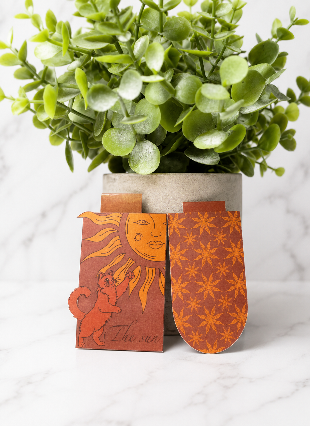 Magnetic bookmark set showing sun cat design and matching sun pattern 