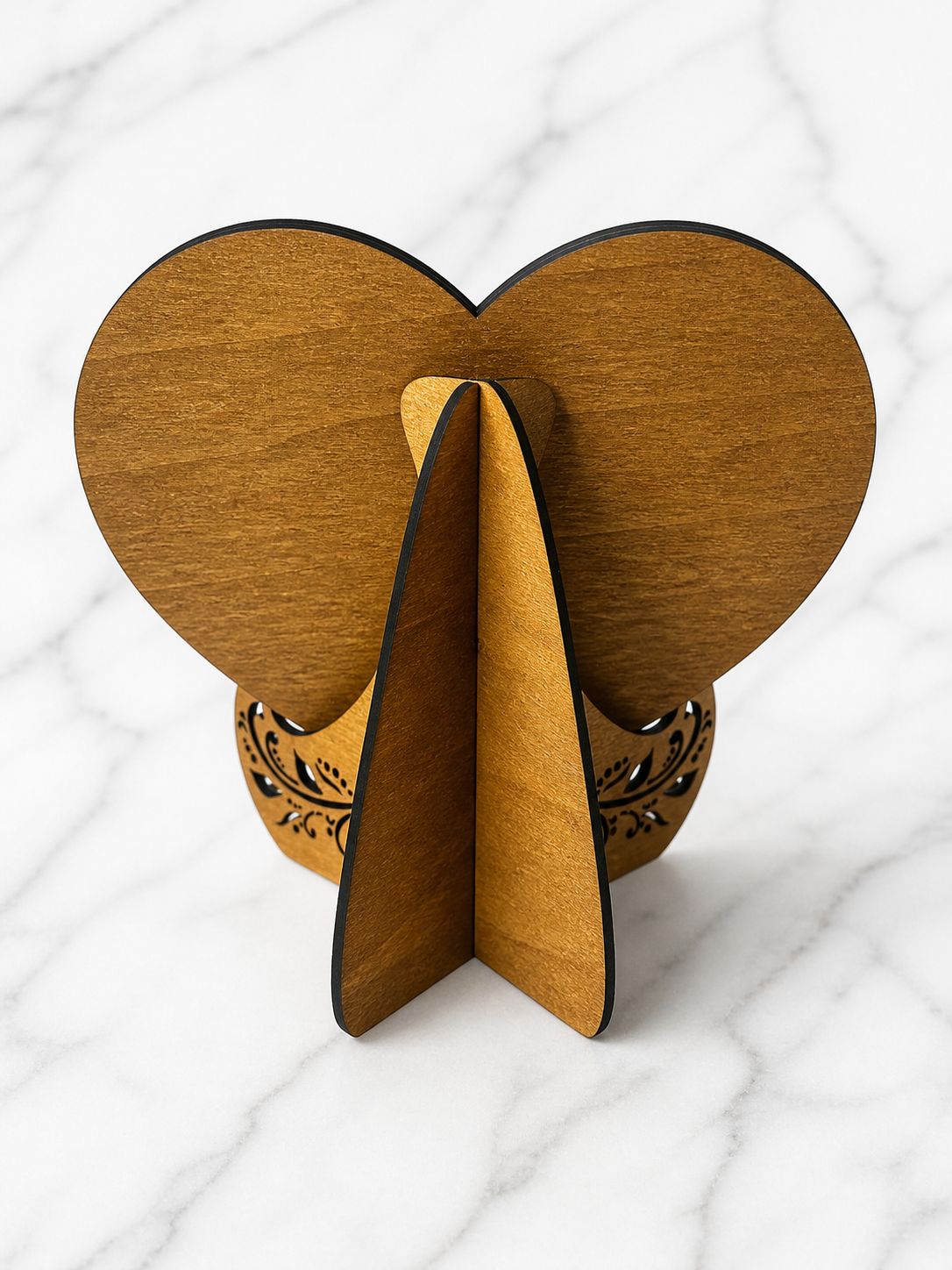 Back view of personalised wooden heart puzzle showing slot-in display stand and wood finish
